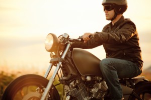 riding motorcycle in the sunset